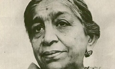 Close photographic portrait of Sarojini Naidu in later life, looking slightly away from the camera.